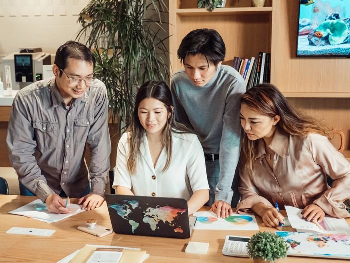 Team reviewing client work together